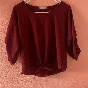 I am selling a papaya dressy shirt.